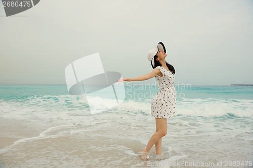 Image of Happy Beautiful Woman Enjoying Summer Vacation