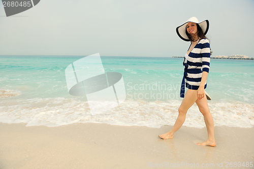 Image of Happy Beautiful Woman Enjoying Summer Vacation