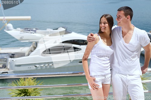 Image of young couple on yacht