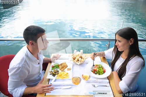 Image of couple having lanch at beautiful restaurant