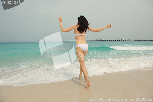 Image of Happy Beautiful Woman Enjoying Summer Vacation