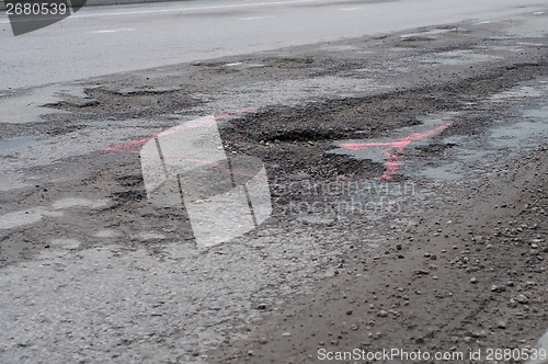 Image of Big pothole on the road