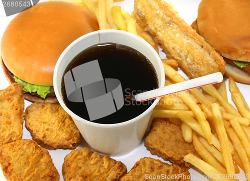 Image of Hamburgers fried potatoes and drink