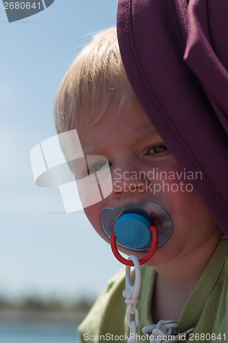 Image of Portrait of baby with pacifier