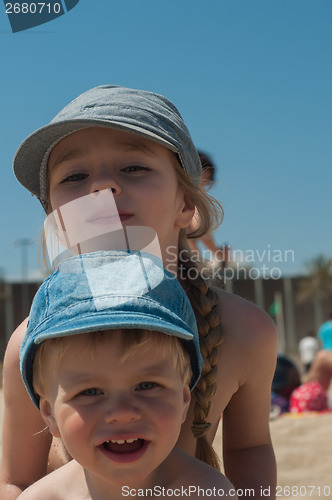 Image of Brother and sister on the beach