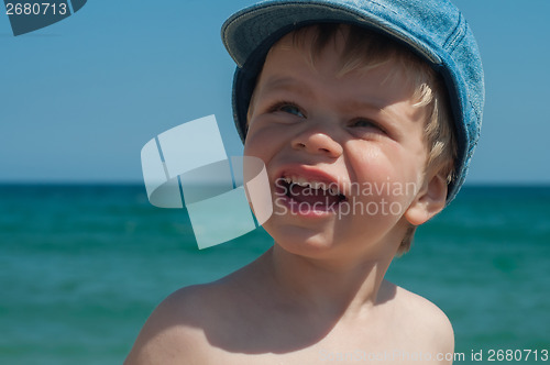 Image of Lovely little boy in denim cap