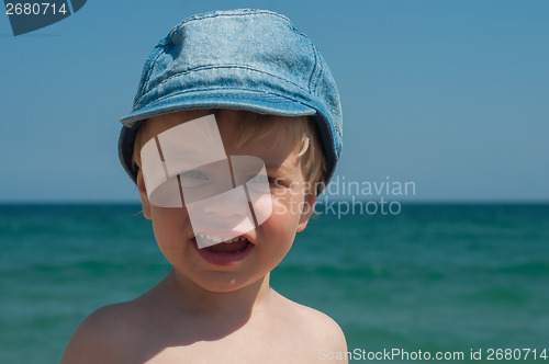 Image of Cute little boy in denim cap