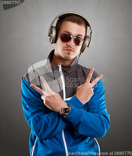 Image of Man in Glasses With Headphones