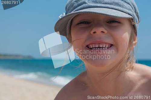 Image of Cute little girl in denim cap