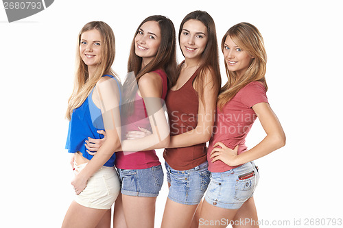 Image of Happy group of friends standing in a row