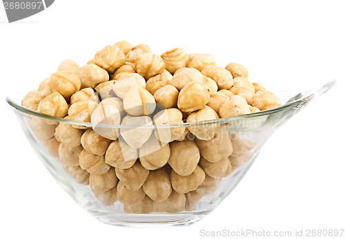 Image of hazelnuts in glass piala. Isolation on white background