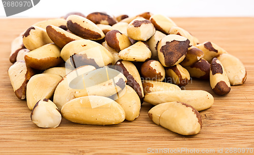 Image of A close-up of Brazil nuts on a white background