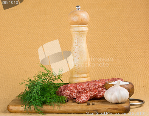 Image of Simple still life with cut sausage