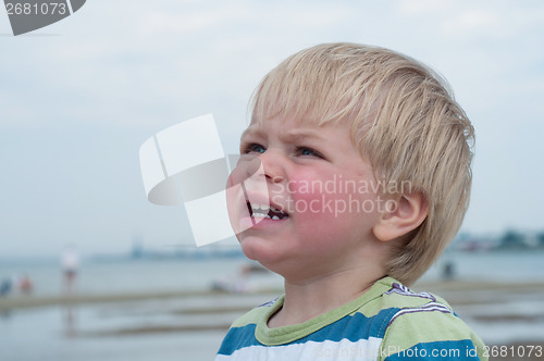 Image of Portrait of boy in striped t-hirt