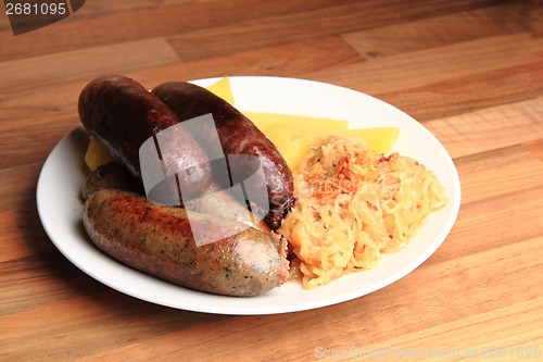 Image of czech food - black and white pudding with potatoes and sauerkrau