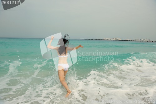 Image of Happy Beautiful Woman Enjoying Summer Vacation