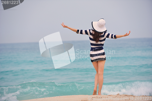 Image of Happy Beautiful Woman Enjoying Summer Vacation