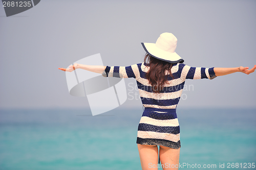 Image of Happy Beautiful Woman Enjoying Summer Vacation