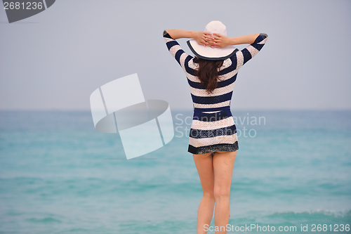 Image of Happy Beautiful Woman Enjoying Summer Vacation