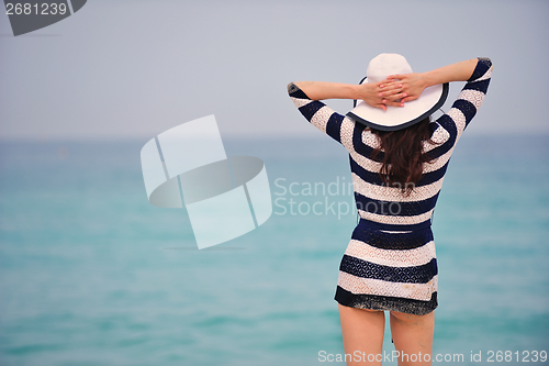 Image of Happy Beautiful Woman Enjoying Summer Vacation