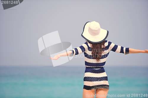 Image of Happy Beautiful Woman Enjoying Summer Vacation