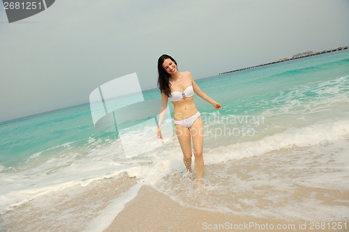 Image of Happy Beautiful Woman Enjoying Summer Vacation