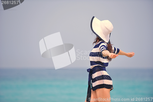Image of Happy Beautiful Woman Enjoying Summer Vacation