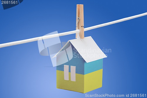 Image of Ukraine flag on paper house