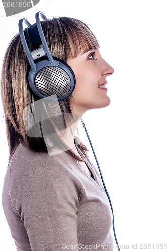 Image of Pretty woman listening music