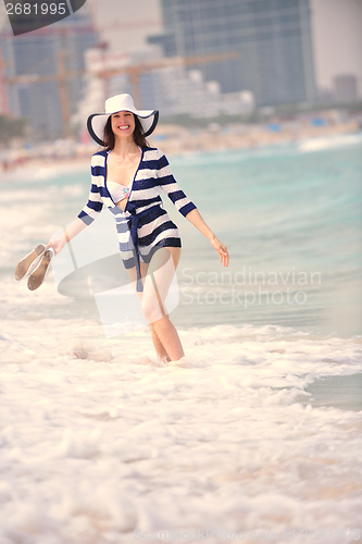 Image of Happy Beautiful Woman Enjoying Summer Vacation