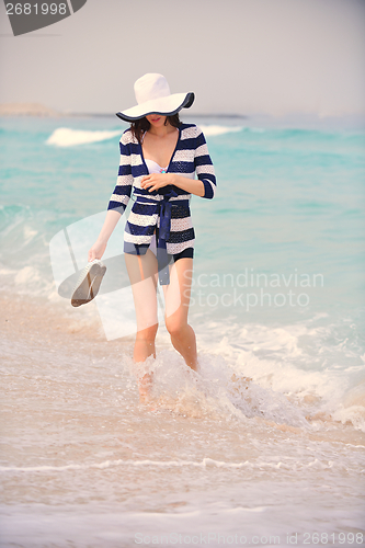 Image of Happy Beautiful Woman Enjoying Summer Vacation