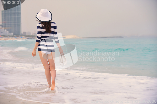 Image of Happy Beautiful Woman Enjoying Summer Vacation