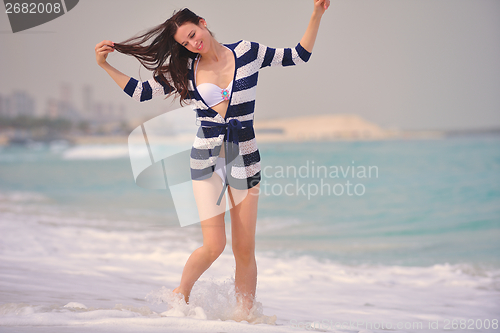 Image of Happy Beautiful Woman Enjoying Summer Vacation