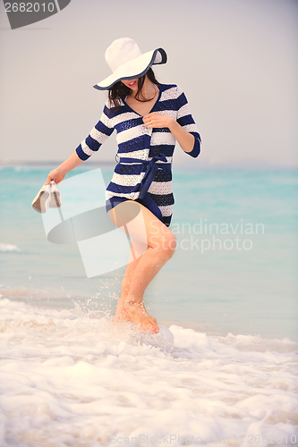 Image of Happy Beautiful Woman Enjoying Summer Vacation