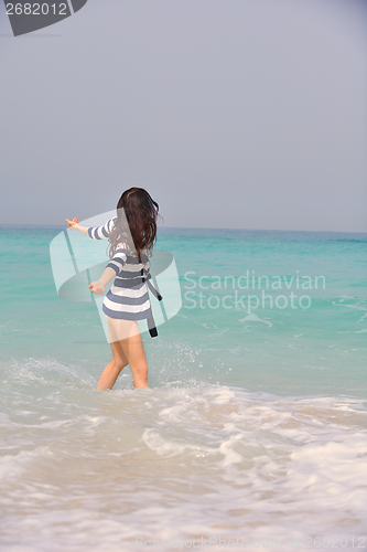 Image of Happy Beautiful Woman Enjoying Summer Vacation