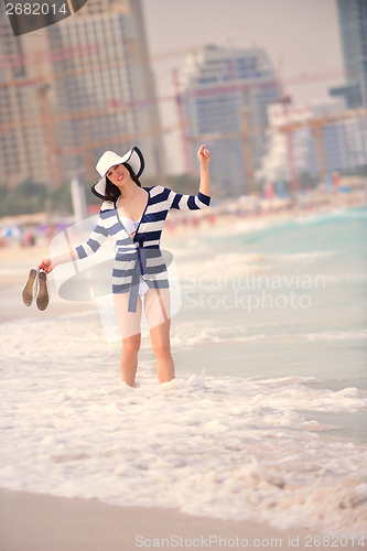 Image of Happy Beautiful Woman Enjoying Summer Vacation