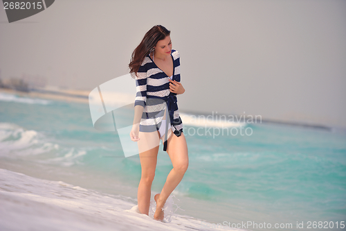 Image of Happy Beautiful Woman Enjoying Summer Vacation