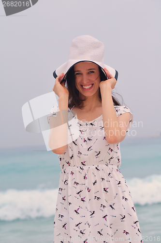 Image of Happy Beautiful Woman Enjoying Summer Vacation