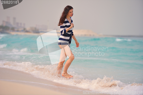 Image of Happy Beautiful Woman Enjoying Summer Vacation