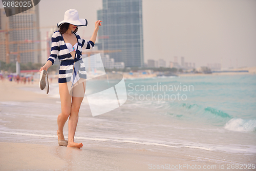 Image of Happy Beautiful Woman Enjoying Summer Vacation