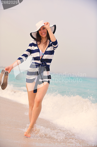 Image of Happy Beautiful Woman Enjoying Summer Vacation