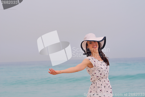 Image of Happy Beautiful Woman Enjoying Summer Vacation