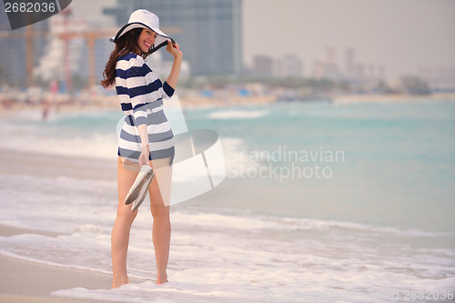 Image of Happy Beautiful Woman Enjoying Summer Vacation