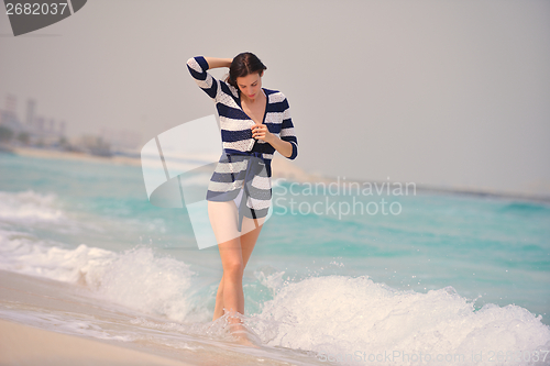 Image of Happy Beautiful Woman Enjoying Summer Vacation