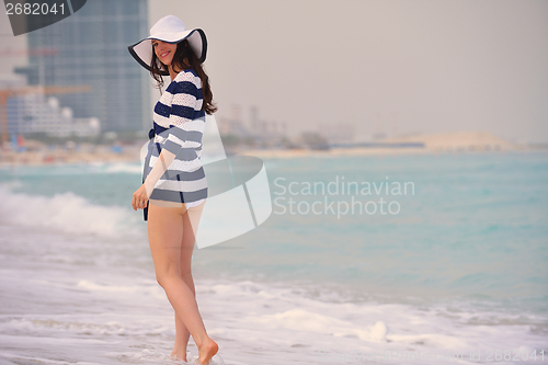 Image of Happy Beautiful Woman Enjoying Summer Vacation