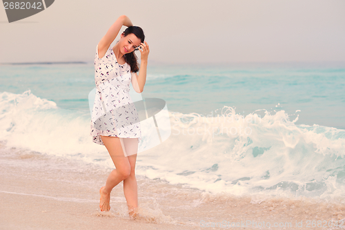 Image of Happy Beautiful Woman Enjoying Summer Vacation