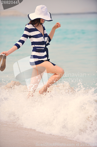 Image of Happy Beautiful Woman Enjoying Summer Vacation