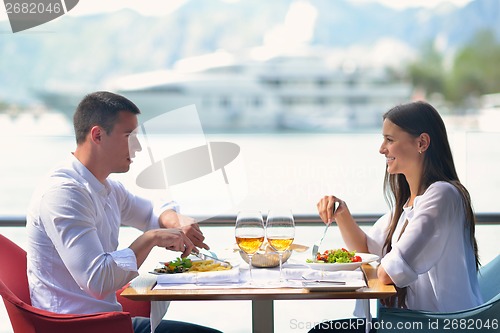 Image of couple having lanch at beautiful restaurant