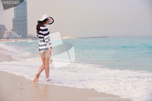 Image of Happy Beautiful Woman Enjoying Summer Vacation