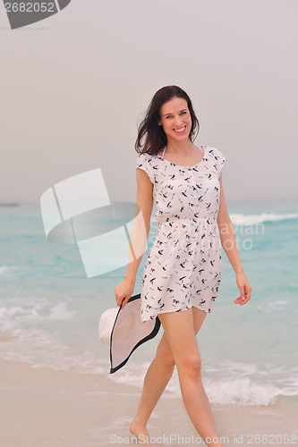 Image of Happy Beautiful Woman Enjoying Summer Vacation